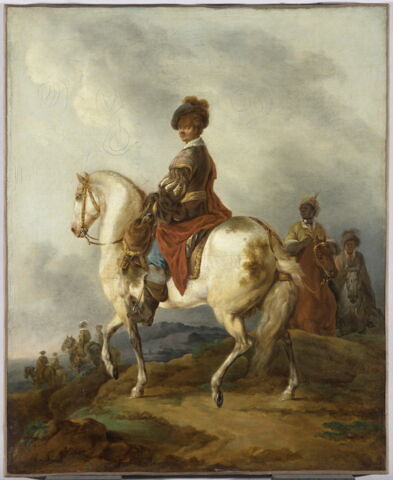Cavalier sur un cheval blanc