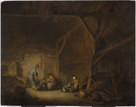 Famille dans une grange