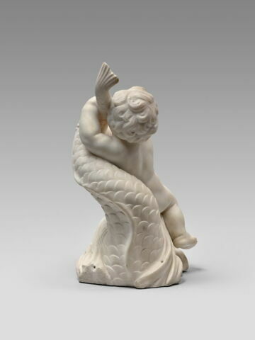 Enfant chevauchant un dauphin, image 2/5