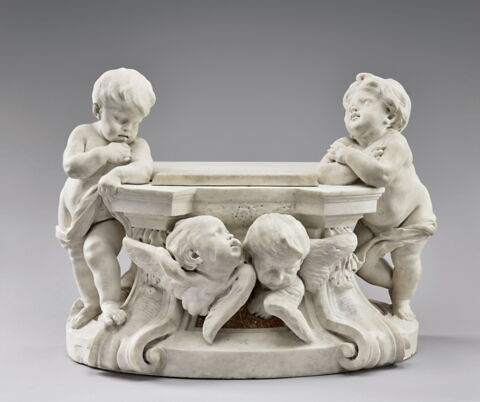 Deux petits anges et deux têtes de chérubins