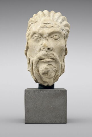 Tête d'homme coiffé d'un bonnet côtelé