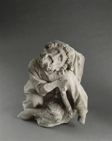 Homme appuyé sur une béquille, image 7/13