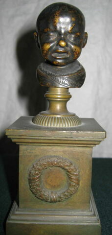 Statuette : tête d'enfant pleurant