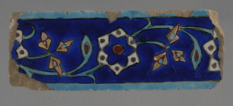 Fragment de carreau de revêtement