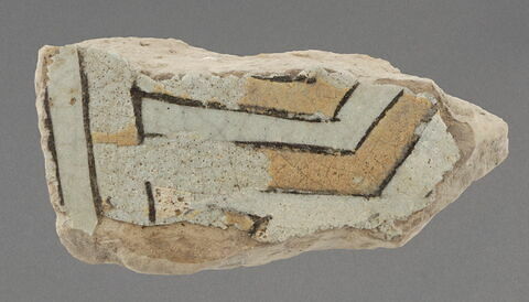 Fragment de carreau de revêtement