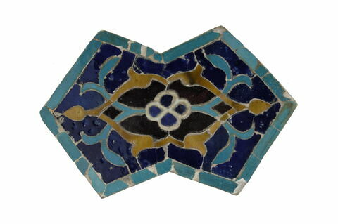 Carreau de revêtement à décor végétal stylisé