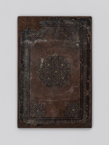 Plat de reliure à l'étoile meublée d'entrelacs dorés