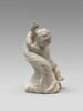 Enfant chevauchant un dauphin, image 2/5