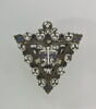Médaillon triangulaire en cuivre émaillé, orné d'une croix, image 1/2