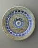 Plat à motif central rayonnant et fleuri, image 1/4
